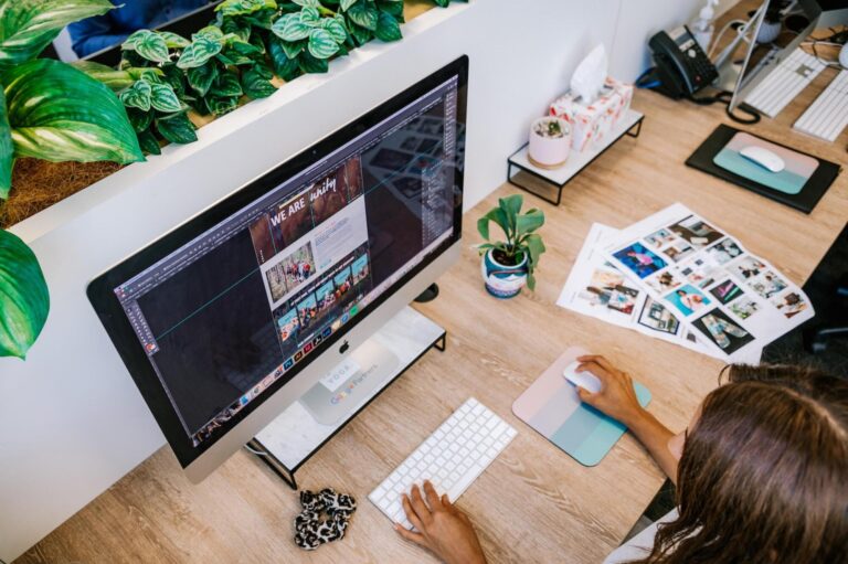 Image of female searching PC for ideal web development company in Florida.